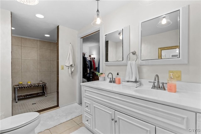 bathroom with tile patterned floors and vanity