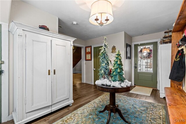 entrance foyer featuring dark hardwood / wood-style floors