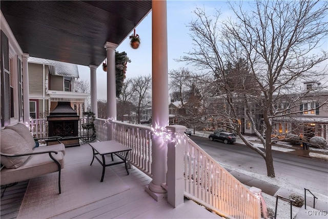 wooden deck featuring a porch