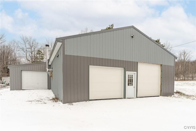 view of snow covered garage