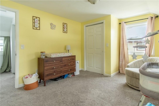 living area with light colored carpet