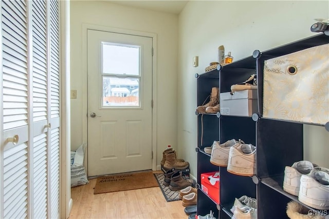 doorway to outside with light hardwood / wood-style flooring