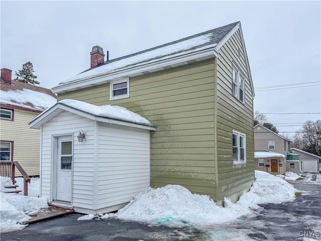 view of snow covered property