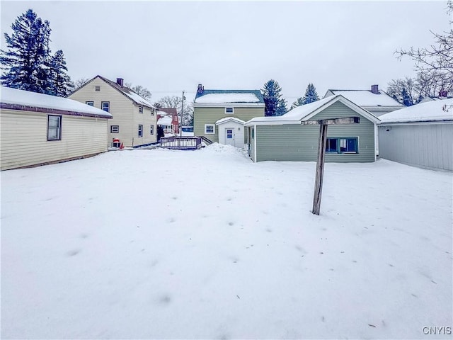 view of yard covered in snow