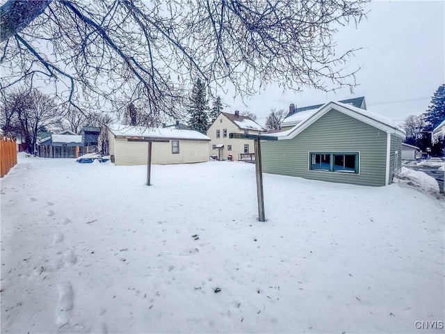 view of yard layered in snow