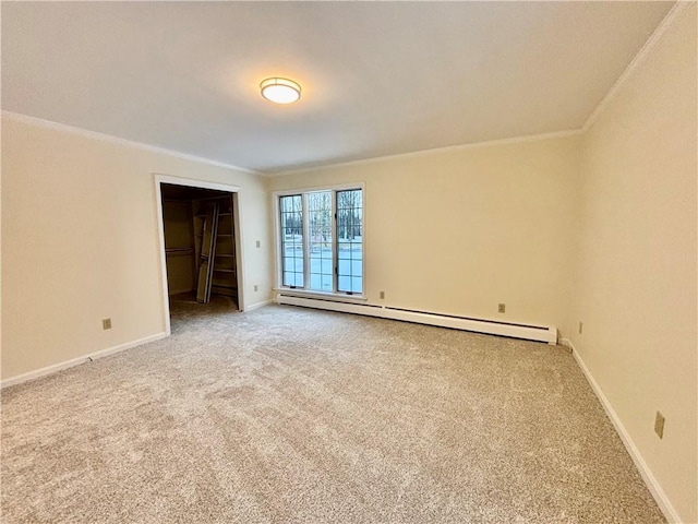 unfurnished bedroom featuring carpet, a baseboard heating unit, baseboards, and ornamental molding