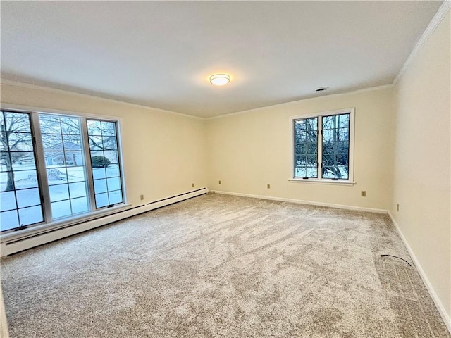 empty room featuring carpet, baseboards, crown molding, and baseboard heating