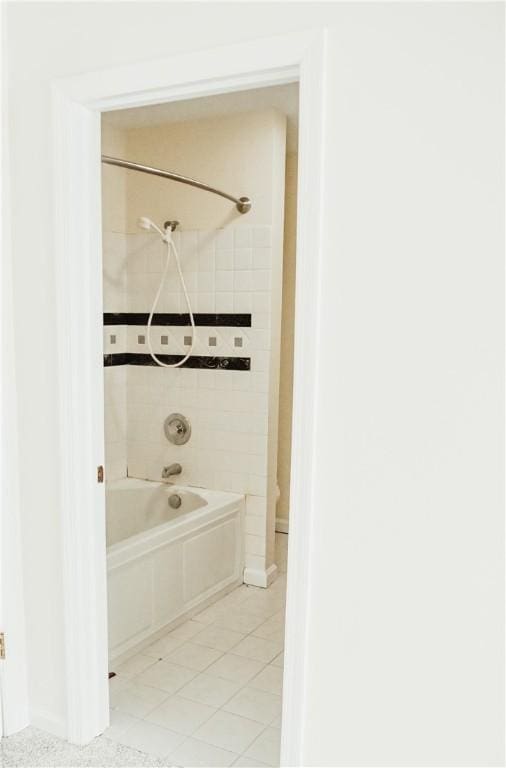 full bathroom with tile patterned flooring and shower / bathtub combination