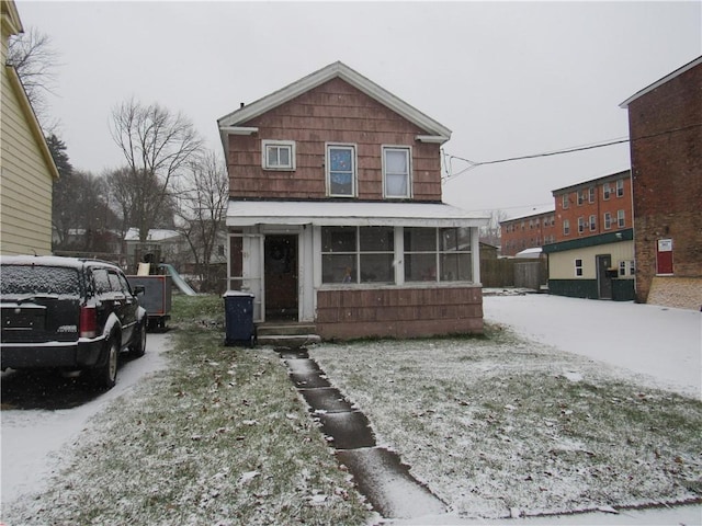 front of property with a sunroom