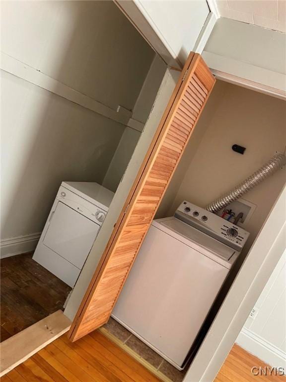 laundry area featuring hardwood / wood-style floors and hookup for a washing machine