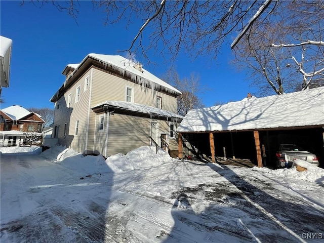 view of snow covered property