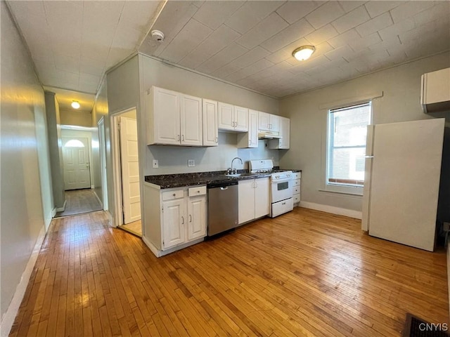 kitchen featuring white cabinetry, light wood-type flooring, white appliances, and sink