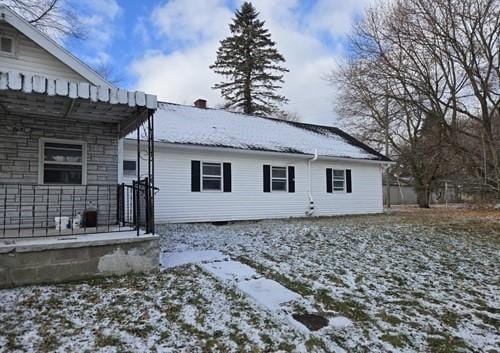 view of snow covered property