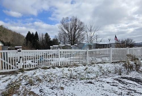 view of yard covered in snow