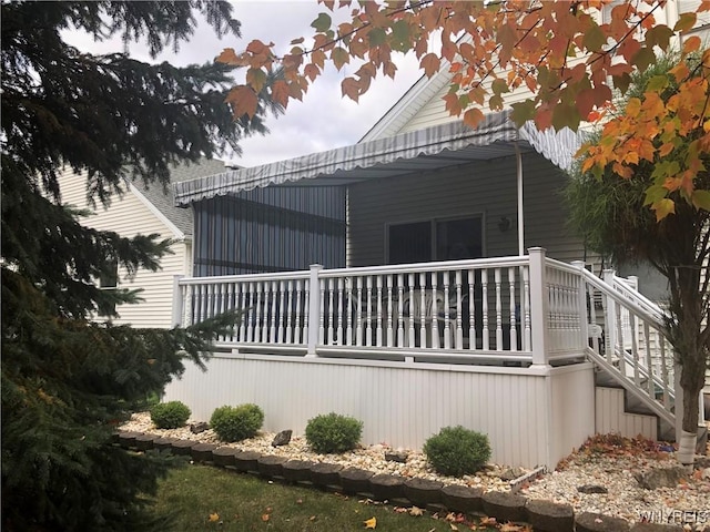 view of home's exterior with a deck