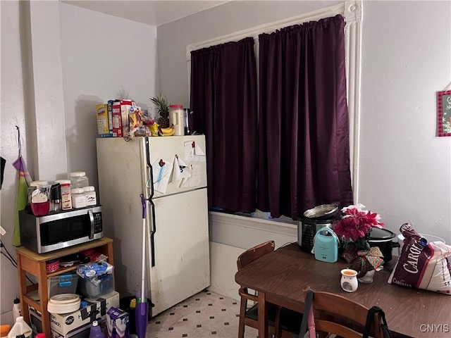 kitchen featuring white refrigerator