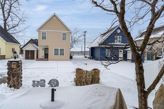 view of snow covered house