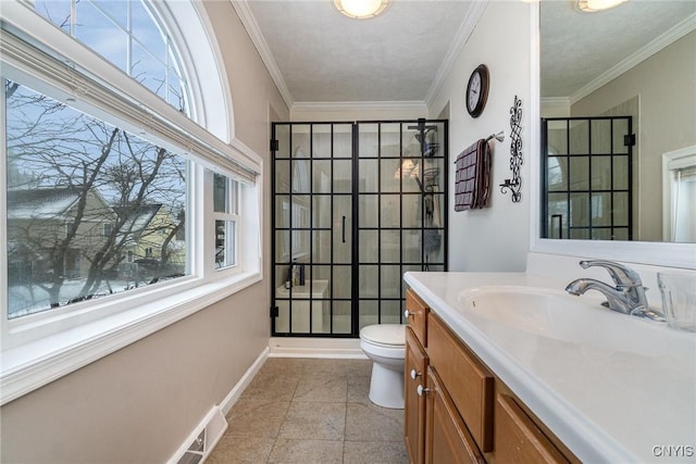 bathroom with crown molding, tile patterned flooring, vanity, and toilet