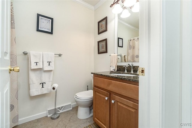 bathroom featuring tile patterned flooring, vanity, toilet, and ornamental molding