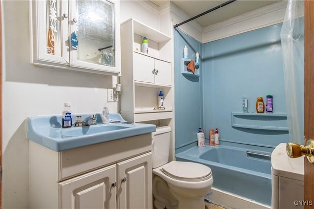 full bathroom with toilet, vanity, and tub / shower combination