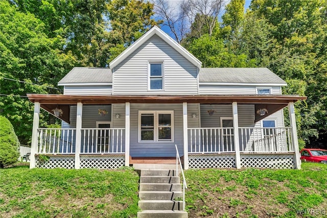 country-style home featuring covered porch