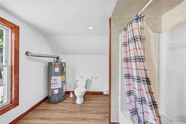 bathroom featuring shower / bath combo, vaulted ceiling, water heater, hardwood / wood-style floors, and toilet