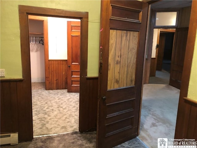 closet with a baseboard heating unit