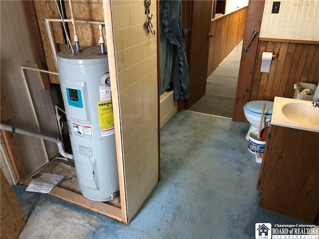 utility room with sink and water heater