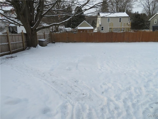 view of yard covered in snow