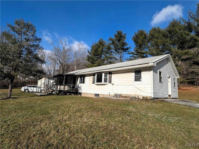 7909 County Route 333, Thurston, NY 14821 - view of front facade featuring metal roof and a front yard