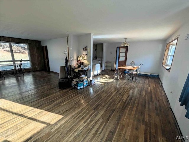 7909 County Route 333, Thurston, NY 14821 - dining room featuring plenty of natural light, wood finished floors, and a notable chandelier