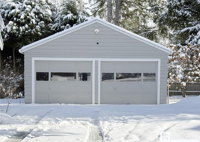 view of snow covered garage