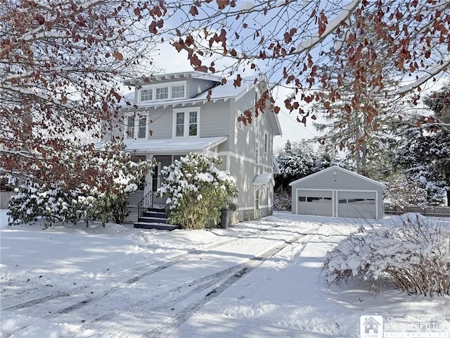 view of front of property with an outdoor structure and a garage