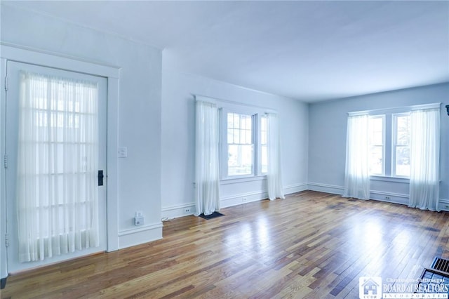 empty room with light wood-type flooring