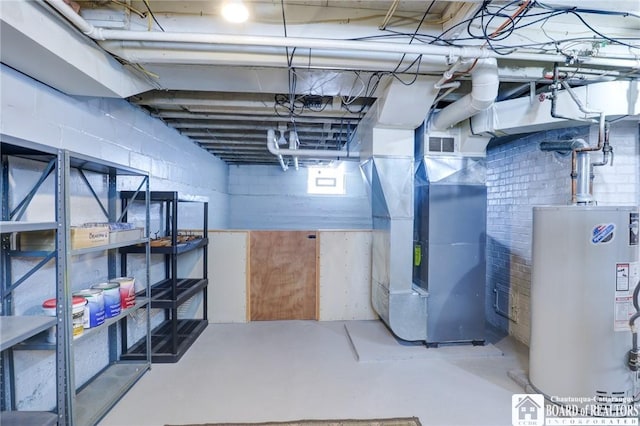 basement with heating unit and gas water heater