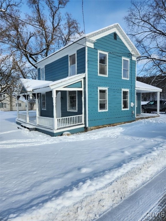 view of front of house with a carport