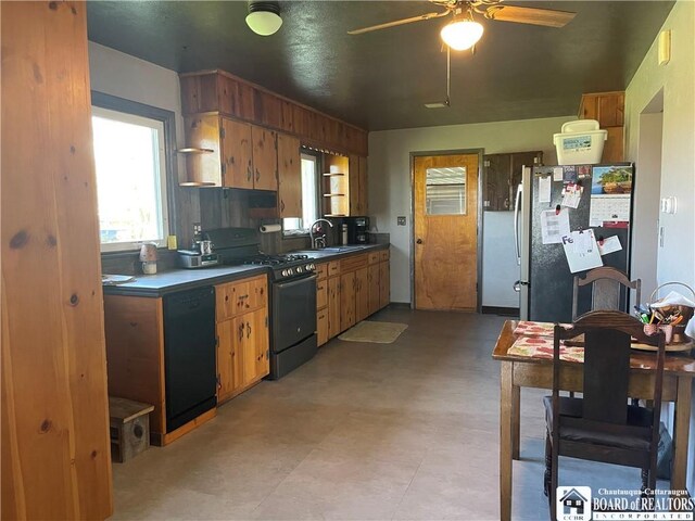 355 New Buffalo Rd, French Creek, NY 14724 - kitchen featuring black appliances, a ceiling fan, dark countertops, and plenty of natural light