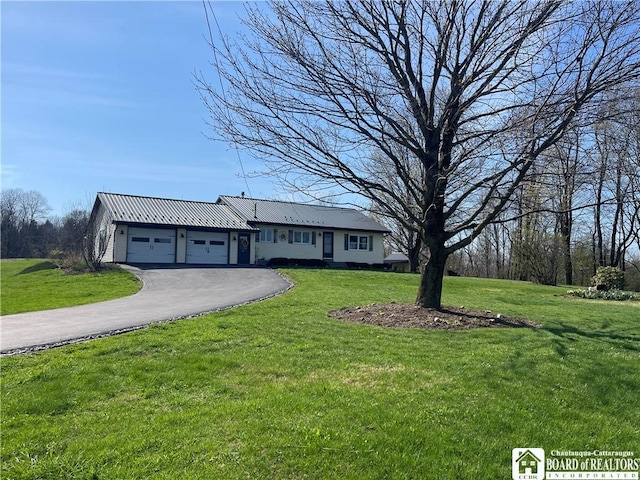 355 New Buffalo Rd, French Creek, NY 14724 - single story home featuring asphalt driveway, an attached garage, a front lawn, and metal roof