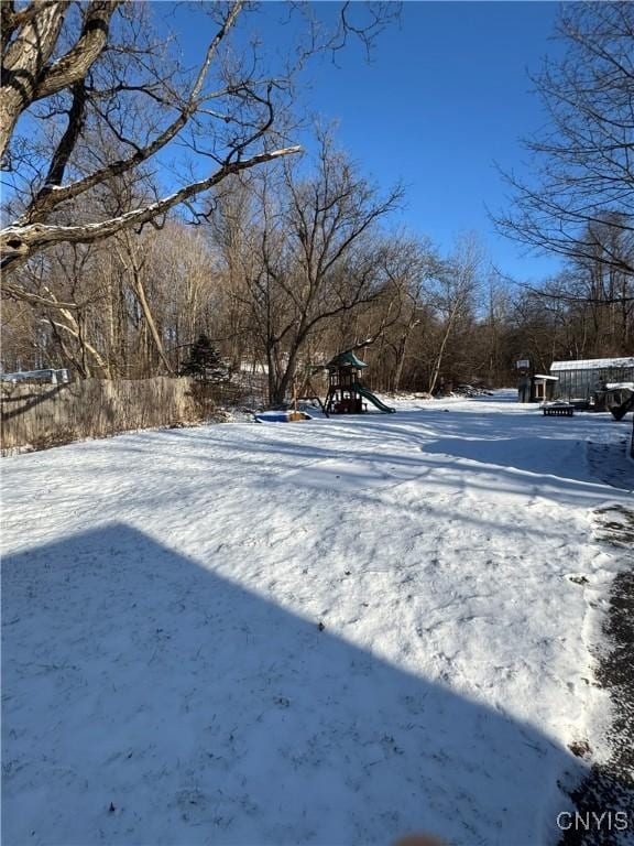 view of yard covered in snow