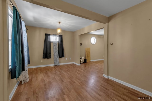 empty room with light hardwood / wood-style floors