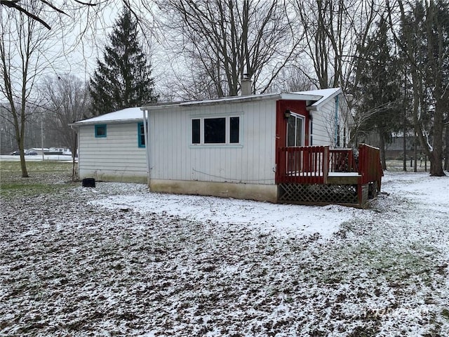 view of snow covered property