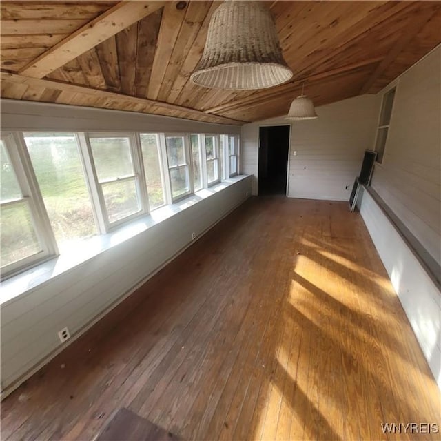 unfurnished sunroom with wooden ceiling and lofted ceiling