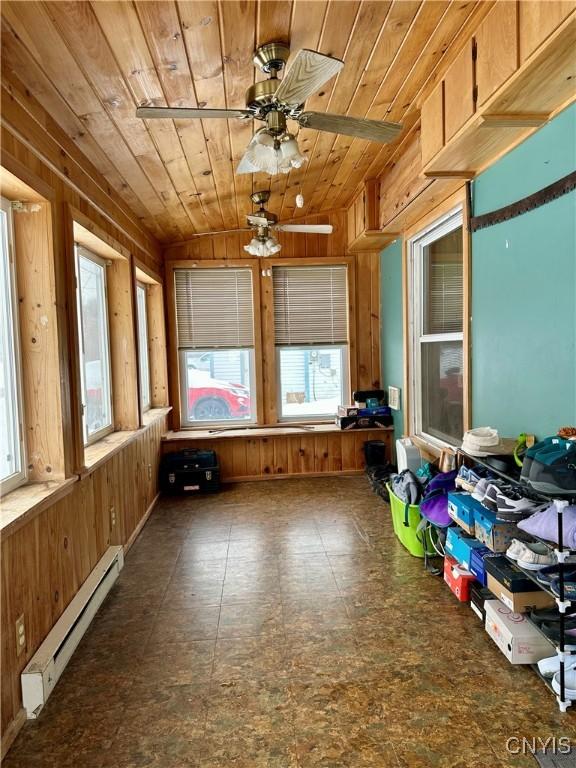57 Liberty St, Adams, NY 13605 - unfurnished sunroom with a baseboard heating unit