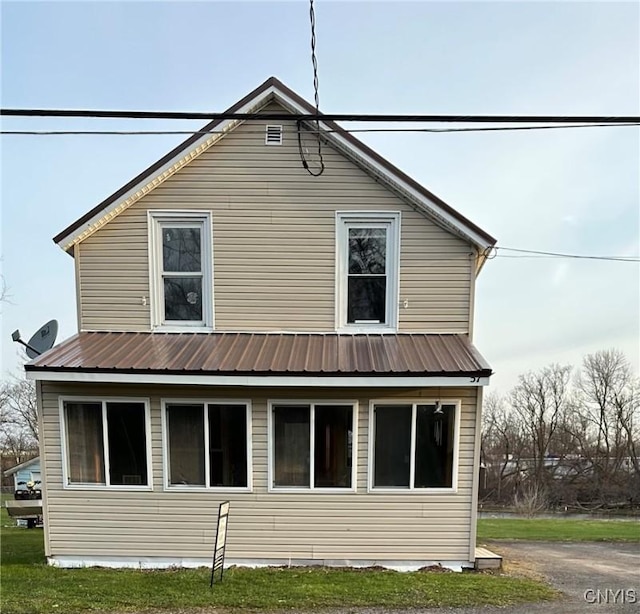 57 Liberty St, Adams, NY 13605 - rear view of property featuring metal roof
