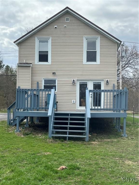 57 Liberty St, Adams, NY 13605 - rear view of property with a wooden deck, a lawn, and stairs