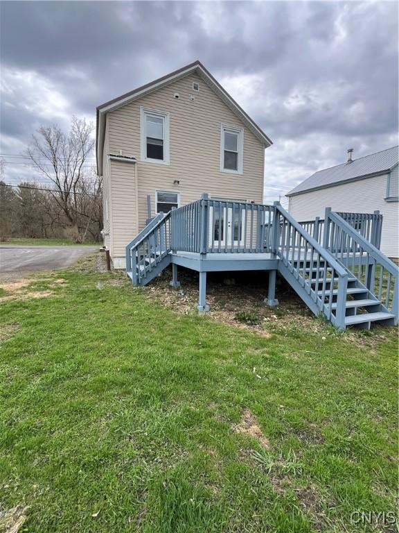 57 Liberty St, Adams, NY 13605 - back of house featuring a wooden deck, a yard, and stairway