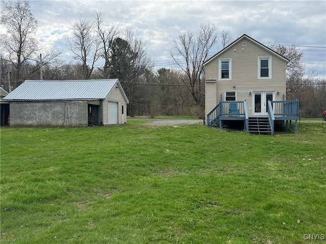 57 Liberty St, Adams, NY 13605 - exterior space featuring an outdoor structure, a yard, and a deck