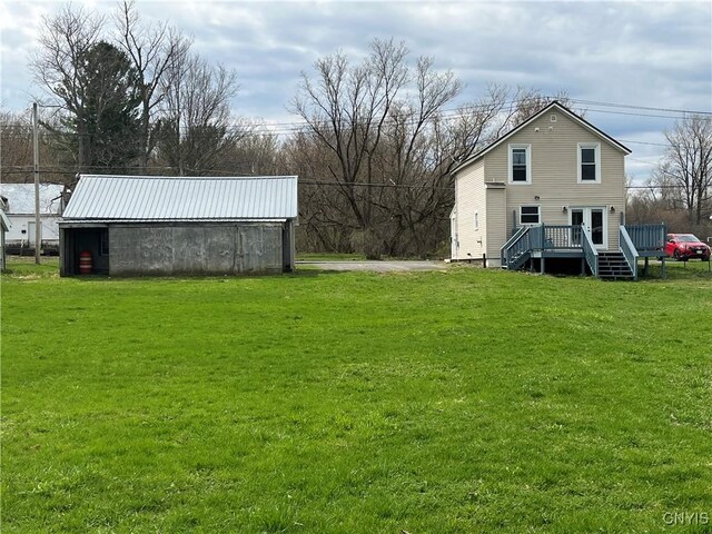 57 Liberty St, Adams, NY 13605 - exterior space with an outbuilding, a yard, and a deck