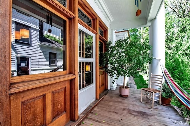 wooden deck featuring covered porch