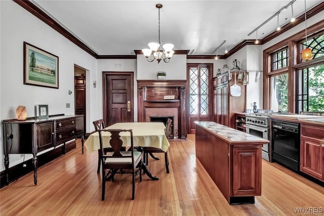 kitchen with dishwasher, hanging light fixtures, light hardwood / wood-style floors, a notable chandelier, and a kitchen island